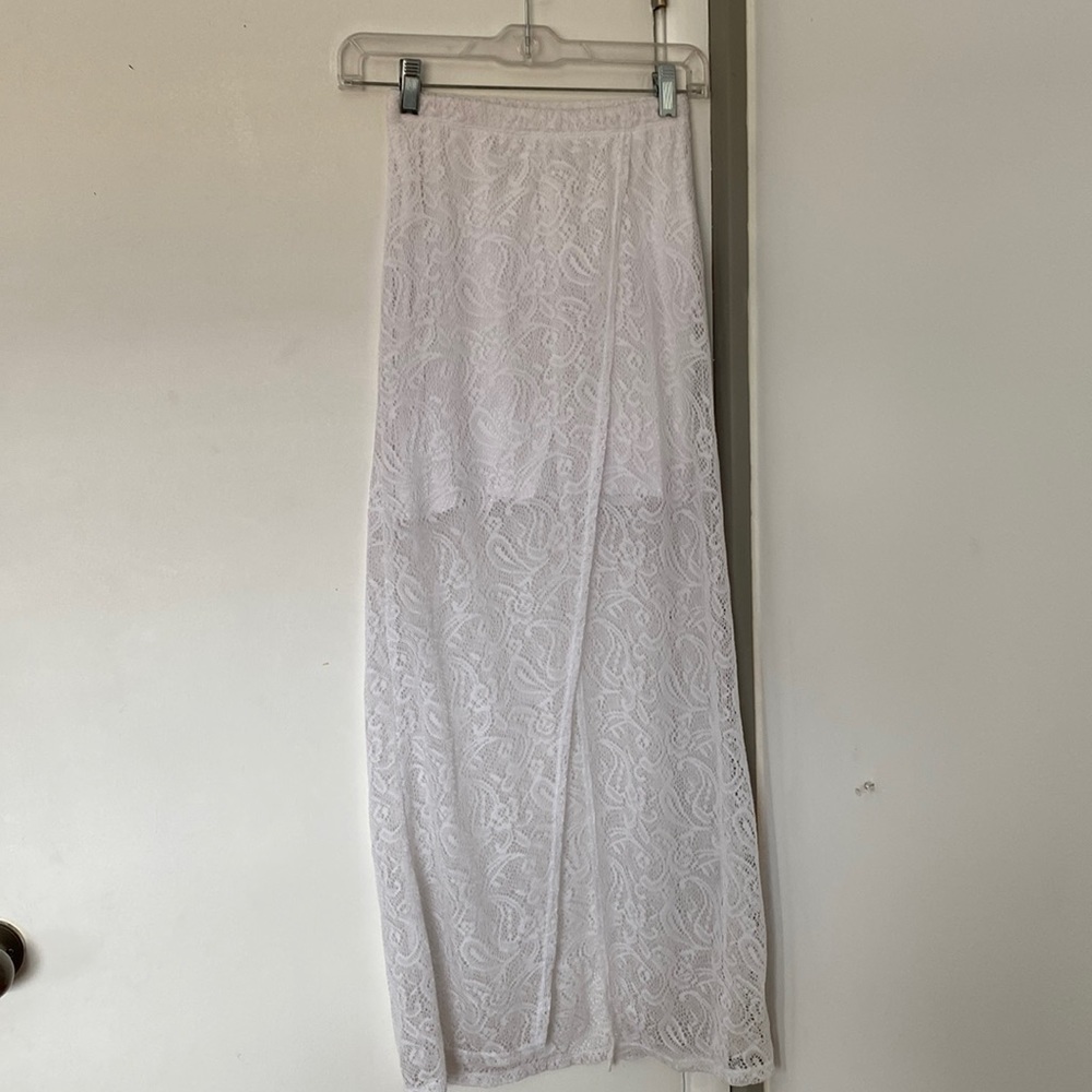 Lacey maxi skirt with skirt slip and slit mid knee. Never worn size XS